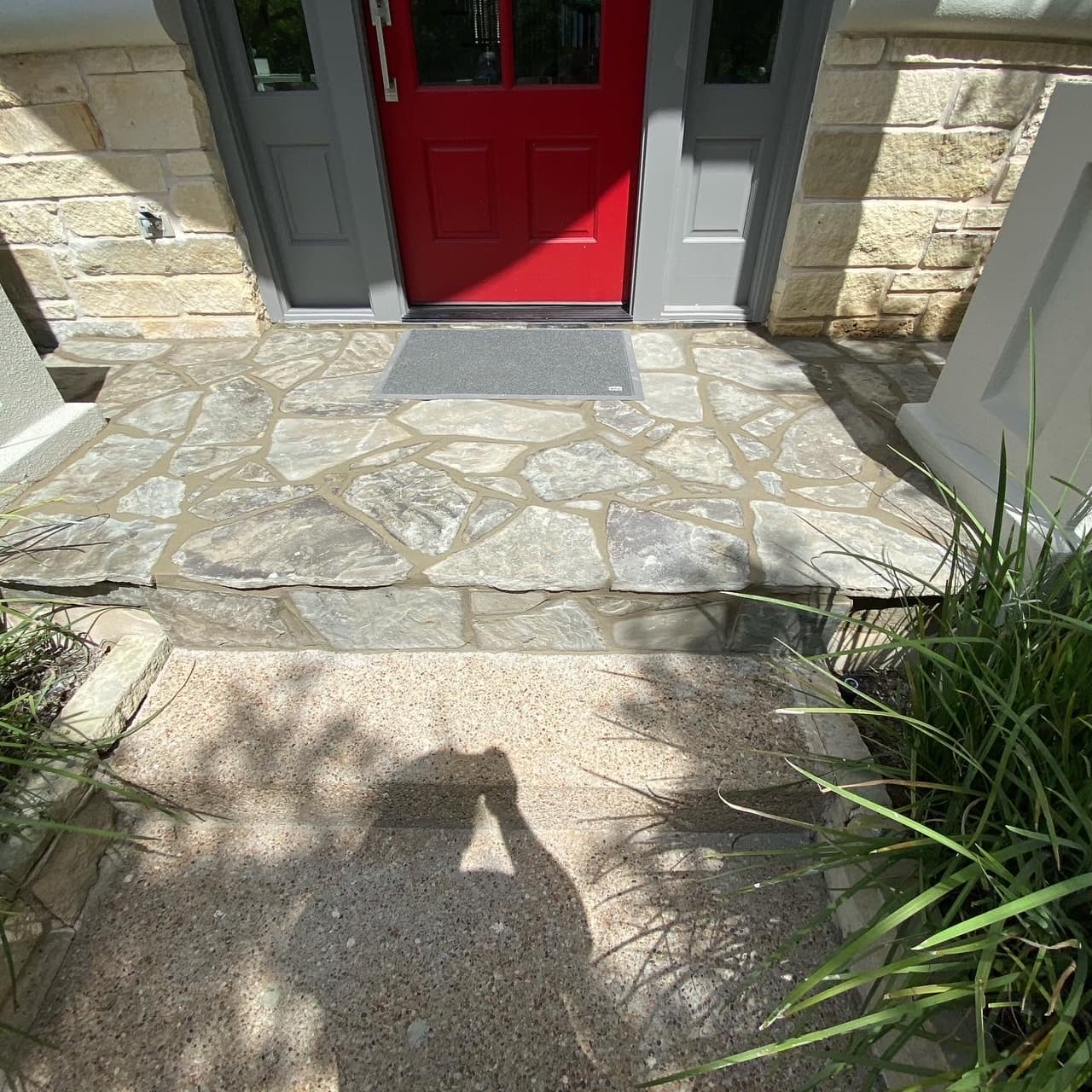 Custom flagstone front entry by Cen-Tex Brick & Masonry